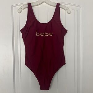 bebe Burgundy One-Piece Swimsuit with Gold Stud Logo